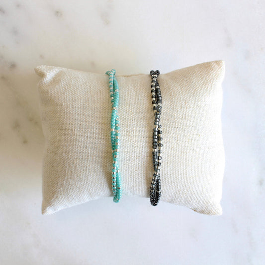 Double strand adjustable beaded bracelet. 